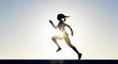 Kvindelig løber som illustration af grøn omstilling 