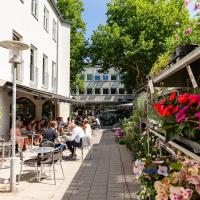 Cafeliv og blomster på en solskinsdag i Lyngby